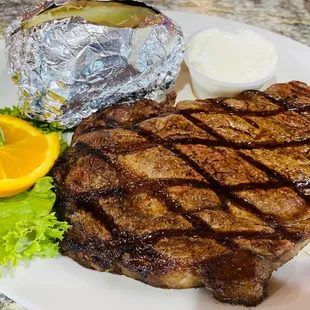 grilled steak and baked potatoes