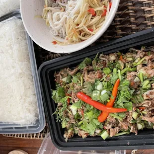 Med cooked beef larb w/ sticky rice and green papaya salad