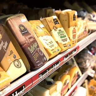 shelves of cheese and cheese products
