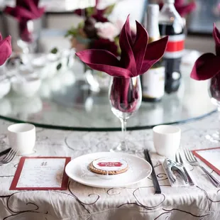 Wedding banquet set up - napkins from Harborview, tablecloths from Unica Party Rentals, floral arrangements from Katharina Stuart Floral.