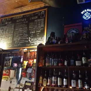 a bar with a chalkboard menu