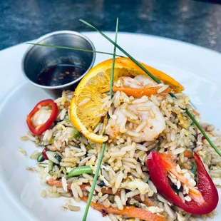 Lunch special: Shrimp Fried Rice with carrots, green beans, mushrooms, fresno peppers, and sautéed shrimp with  honey chipotle reduction