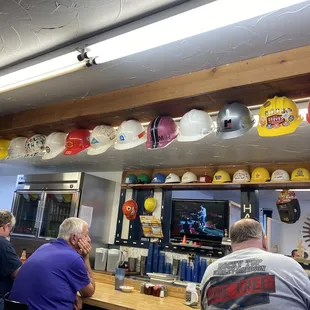 customers sitting at the bar