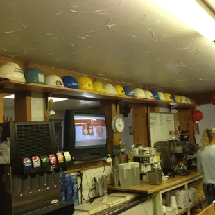 a woman in a hard hat restaurant