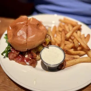 a burger and fries on a plate