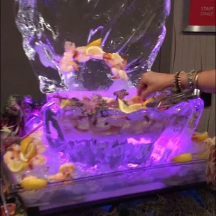 shrimp served in ice sculpture.