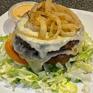 Double burger without the bun - light on the carbs! Can't lettuce wrap because shredded lettuce, but this works!