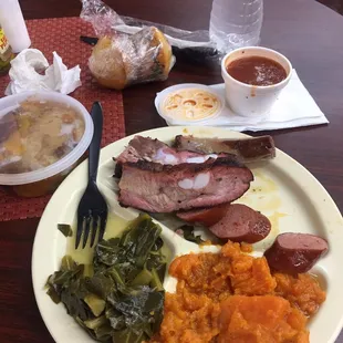 Ribs, sauce &amp; sausage, collard greens, yams, 2 corn breads, and peach cobbler... Excuse me, it&apos;s about to go down!!!