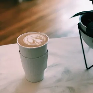 a cup of coffee on a table