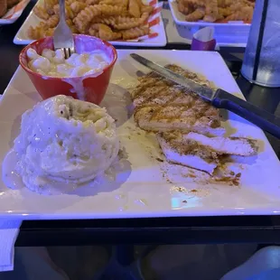 Grilled chicken with mashed potatoes and Mac n cheese  Plus fries