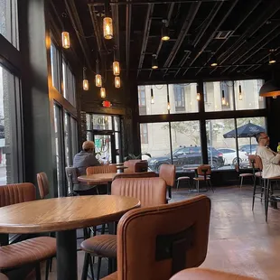 a restaurant with tables and chairs