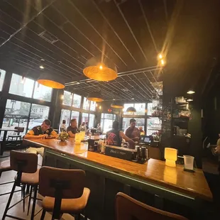 people sitting at a bar