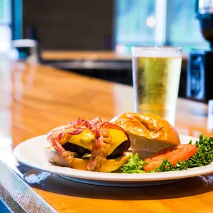 a plate of food and a glass of beer