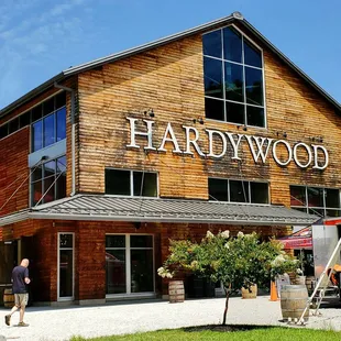 a man walking in front of a building