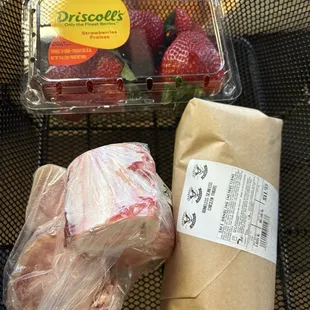 Chicken thighs, bones for my dog &amp; look at these strawberries!