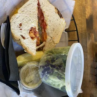 Farmers garden sandwich with a side salad.