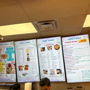 menus on a large screen in a restaurant
