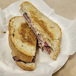 Reuben Sandwich Special. Sauerkraut, corned beef, Swiss, rye. Yum! 10/10 recommended! The cook did a great job!