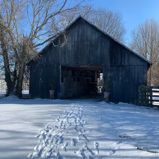 a barn in the snow