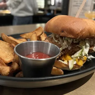Fried chicken sandwich with fries