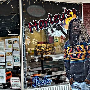 a man standing in front of a store