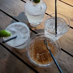 three drinks on a wooden table