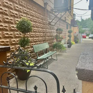 a bench in front of a building