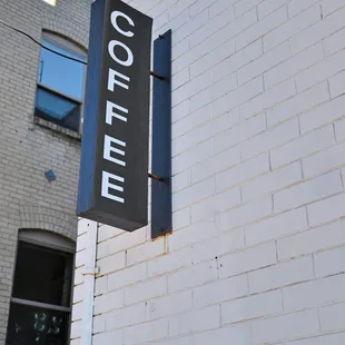 a sign on the side of a building