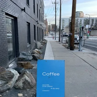 Sign - cafe is around the corner!