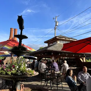 outdoor dining area with tables and umbrellas