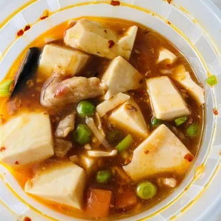 Tofu with peas.. in sweet and sour sauce! I ordered mapo tofu!