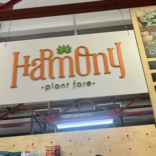 a sign for harmony plant fare