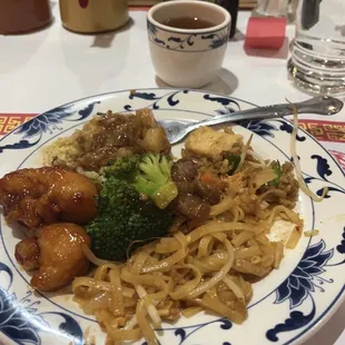 a plate of chinese food on a table