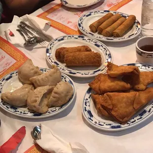 Potstickers, egg rolls, spring rolls and crab rangoon.