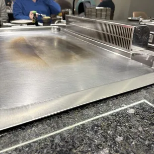 The hibachi tables are smaller than normal and the have that strange fan where the chef stands and has to reach over it