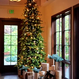 a christmas tree with presents