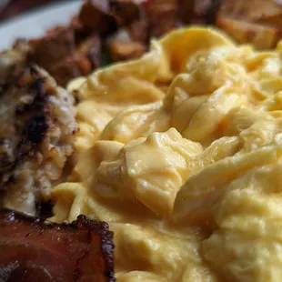 scrambled eggs, bacon and toast