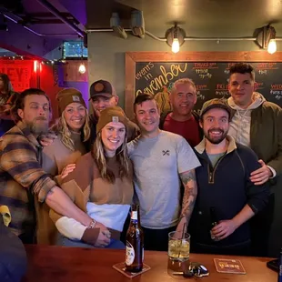 a group of people posing for a picture