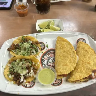 Al pastor tacos and gobernador tacos.
