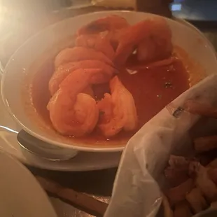 Shrimp in tomato broth.