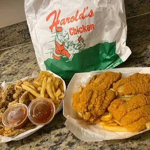 6 wing dinner to the left, large catfish dinner to the right.