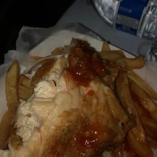 a chicken sandwich with french fries