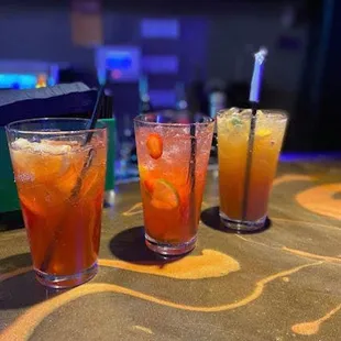 three glasses of cold drinks