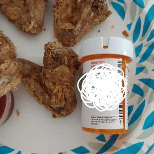 Size of chicken wing compared to a medical bottle.SMH.