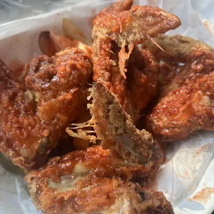 a plate of fried wings