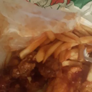 3pc wings &amp; catfish with fries and covered in mild sauce! Yasssss!