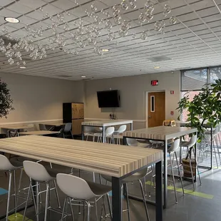 a conference room with tables and chairs