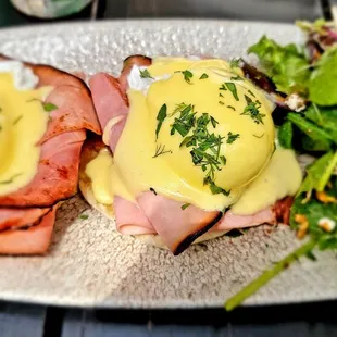 Eggs Benedict and field greens