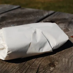 a piece of paper on a picnic table