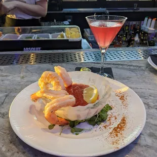 a plate of food and a drink